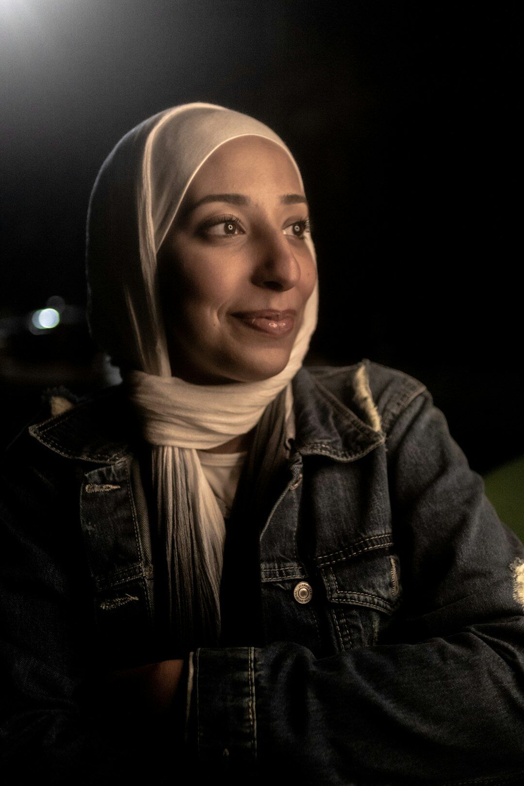 Studio portrait of a Turkish woman journalist smiling